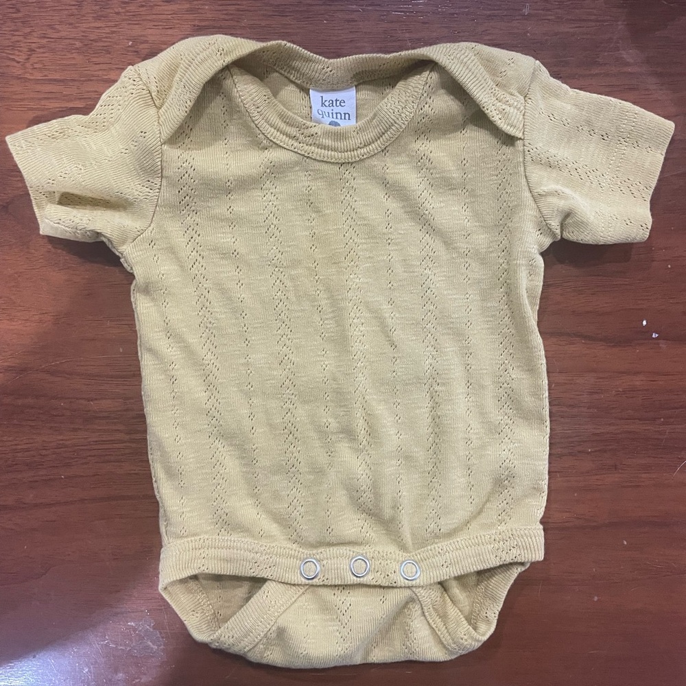 Kate Quinn Onesie